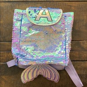 Sequin justice backpack initial A
